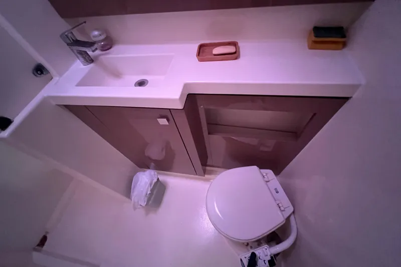B&b Yachts Yacht Photos Pics Bathroom interior of 2019 Fountaine Pajot SABA 50 yacht, featuring sink and toilet.