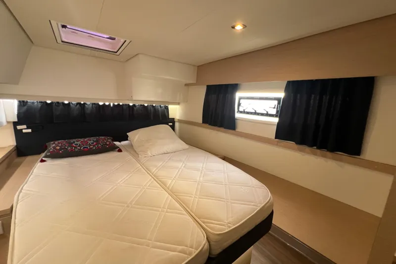 B&b Yachts Yacht Photos Pics 2019 Fountaine Pajot SABA 50 cabin with twin beds, modern design, and natural lighting.