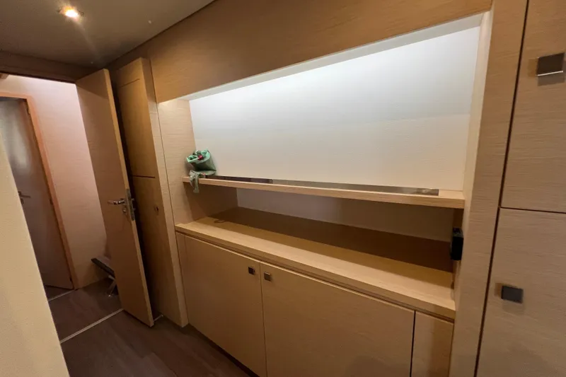 B&b Yachts Yacht Photos Pics Interior of 2019 Fountaine Pajot SABA 50 yacht with modern wooden cabinetry.