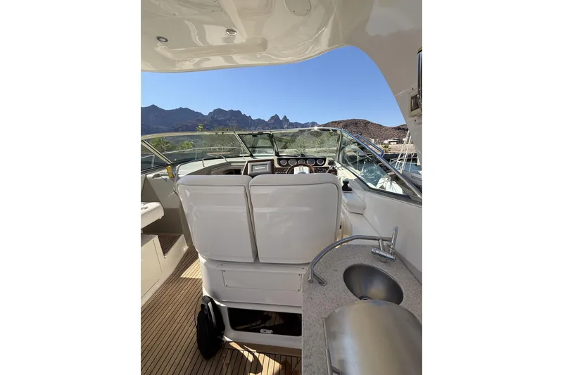  Yacht Photos Pics Interior view of 2011 Sea Ray 370 Sundancer yacht with helm and sink.