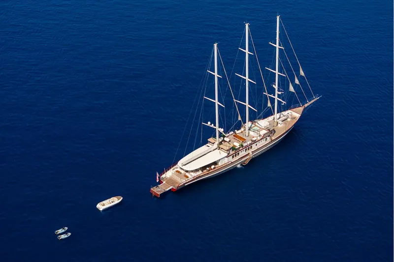 The Langley Yacht Photos Pics Aerial view of 2009 Aegean Yacht 3 Mast Schooner sailing in deep blue sea.