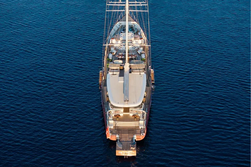 The Langley Yacht Photos Pics Aerial view of 2009 Aegean Yacht 3 Mast Schooner on calm blue waters.