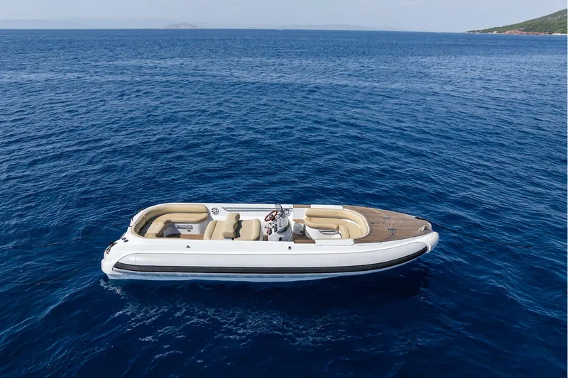 The Langley Yacht Photos Pics Aegean Yacht 3 Mast Schooner, 2009, on calm blue sea.