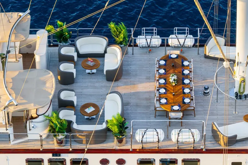 The Langley Yacht Photos Pics Luxurious deck of 2009 Aegean Yacht 3 Mast Schooner with elegant seating and dining area.