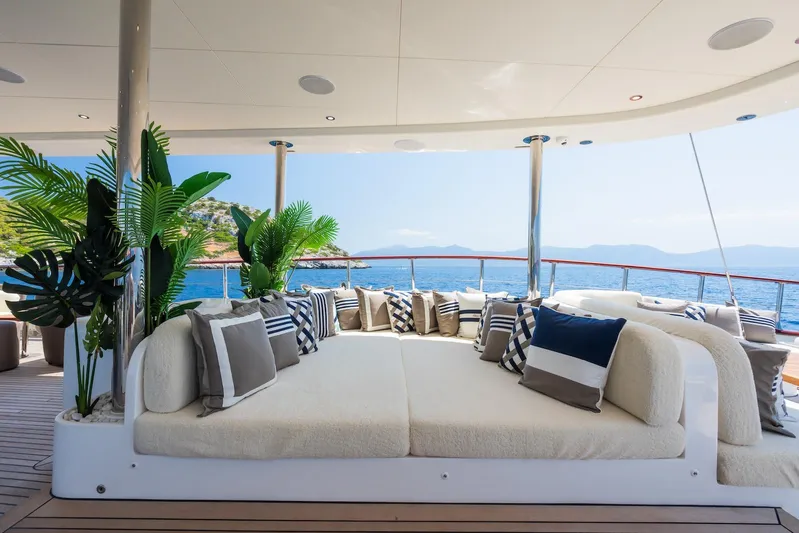 The Langley Yacht Photos Pics Luxurious deck seating on 2009 Aegean Yacht 3 Mast Schooner, with ocean view and plush cushions.