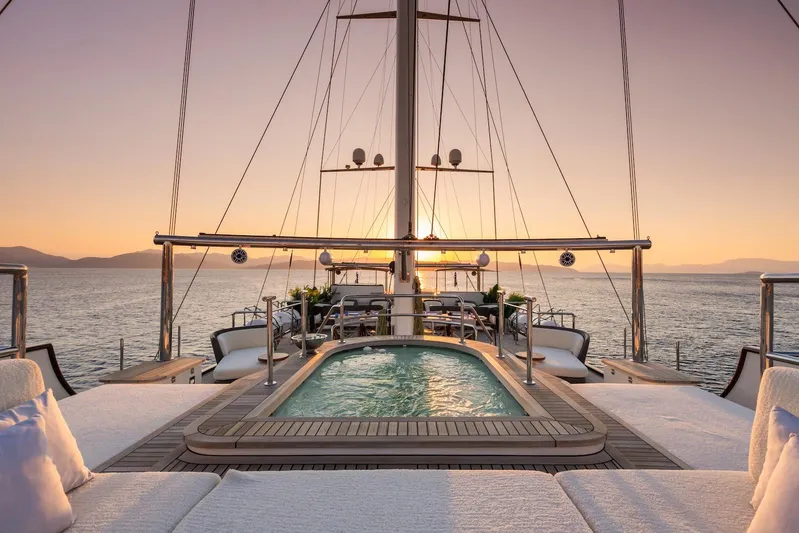 The Langley Yacht Photos Pics Luxurious Aegean Yacht 3 Mast Schooner, 2009, with pool at sunset on the open sea.