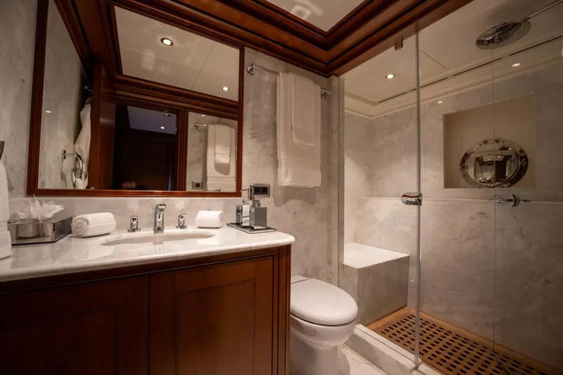The Langley Yacht Photos Pics Luxurious bathroom on 2009 Aegean Yacht 3 Mast Schooner with marble and wood finishes.