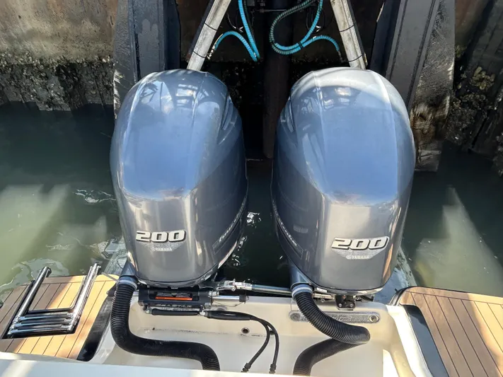  Yacht Photos Pics Twin Yamaha 200 engines on a 2018 Scout 275 LXF boat at dock.
