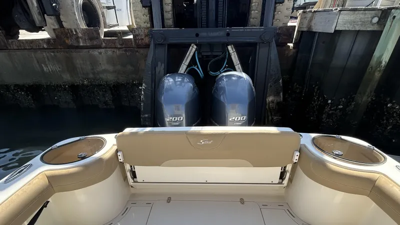  Yacht Photos Pics 2018 Scout 275 LXF boat with dual 200 horsepower engines at dockside.