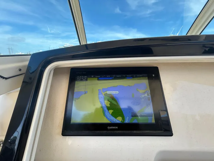  Yacht Photos Pics Garmin navigation display on 2018 Scout 275 LXF boat, showing a detailed marine map.