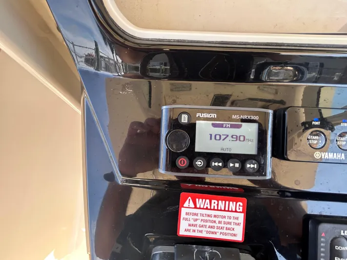  Yacht Photos Pics Control panel of a 2018 Scout 275 LXF boat with Fusion MS-NRX300 radio.