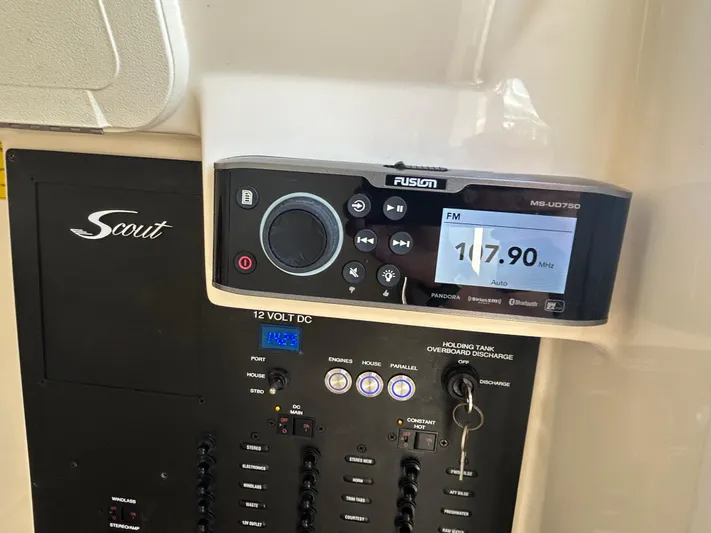  Yacht Photos Pics Control panel of a 2018 Scout 275 LXF boat with Fusion MS-UD750 stereo system.