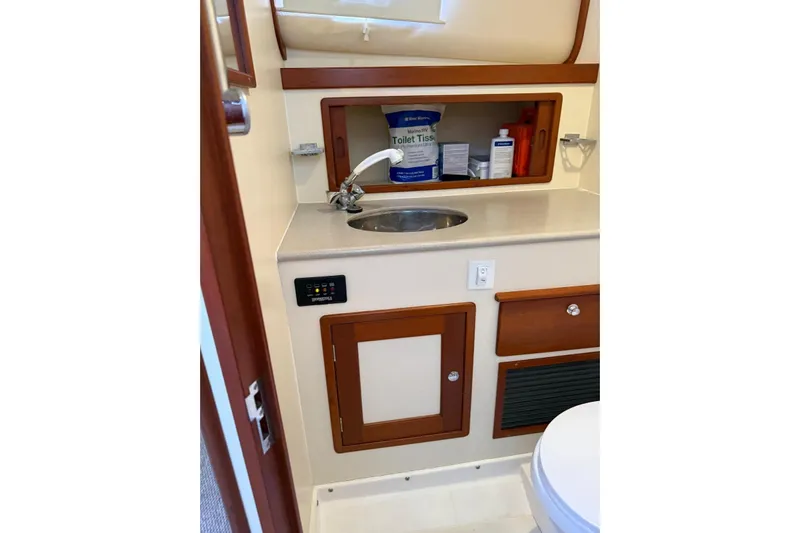 Lark Yacht Photos Pics Little Harbor Whisper Jet 34 (2000) bathroom with sink, storage, and toilet essentials.