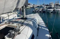 Sailboat Solaris 36 (2003) docked in a marina with other boats.