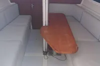 Interior of 2003 Solaris 36 yacht with seating and wooden table.