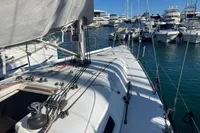 Sailboat Solaris 36, 2003 model, docked in a marina with other boats.