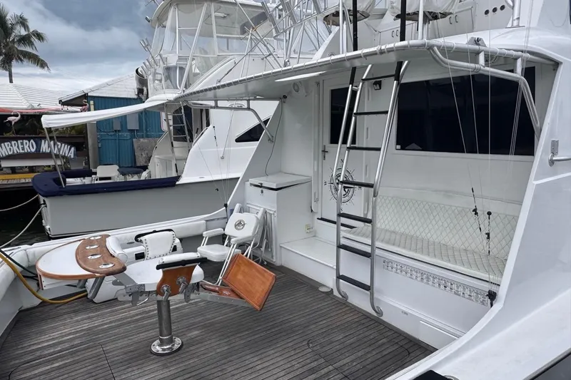  Yacht Photos Pics 1979 Hatteras 53 Motor Yacht with fishing chair and ladder on deck.