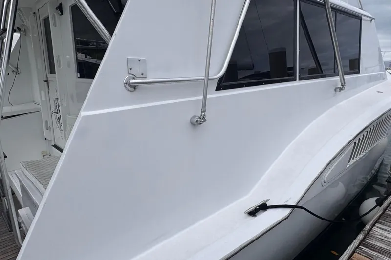  Yacht Photos Pics 1979 Hatteras 53 Motor Yacht, side view with sleek white exterior and windows.