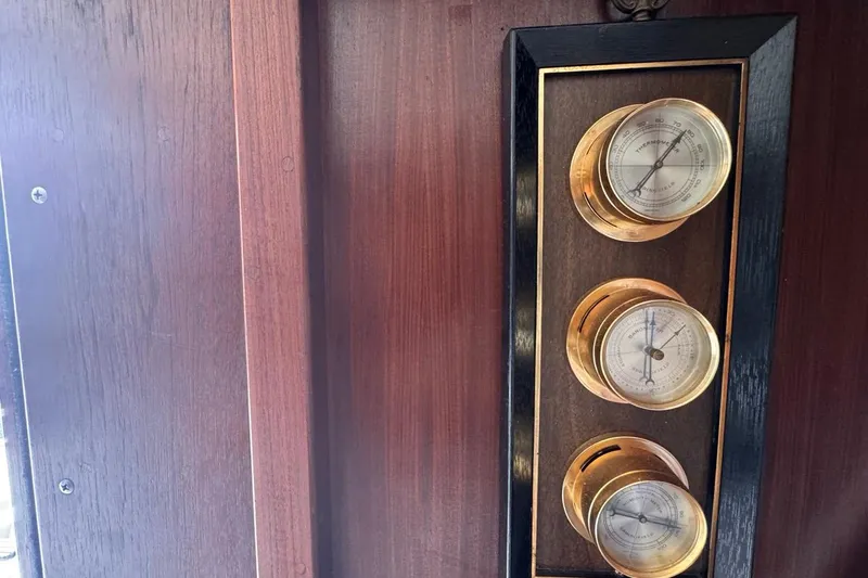  Yacht Photos Pics Vintage brass gauges on 1979 Hatteras 53 Motor Yacht wooden panel.