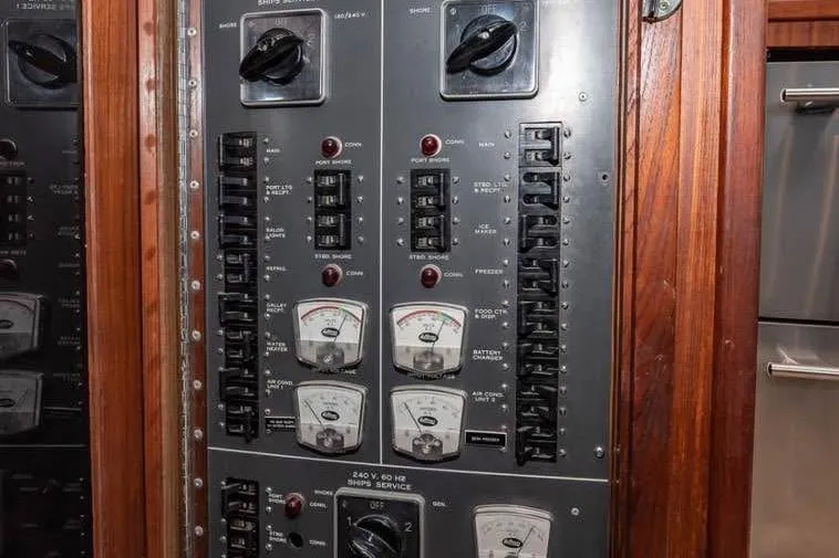  Yacht Photos Pics Electrical panel of a 1979 Hatteras Sportfish 53' yacht with switches and gauges.