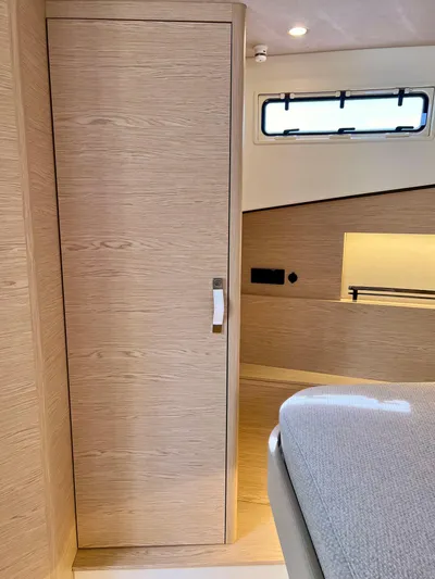  Yacht Photos Pics 2024 Solaris Power 44 Open interior with modern wood finish and sleek design.