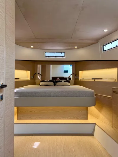 Yacht Photos Pics Luxurious interior of 2024 Solaris Power 44 Open yacht, featuring a modern bedroom design.