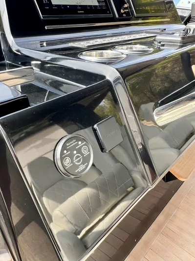  Yacht Photos Pics 2024 Solaris Power 44 Open yacht dashboard with sleek black finish and modern controls.