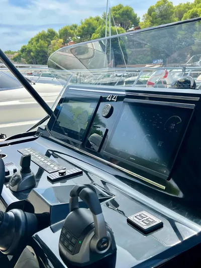  Yacht Photos Pics 2024 Solaris Power 44 Open yacht dashboard with advanced navigation systems.