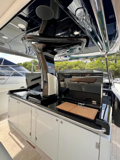  Yacht Photos Pics 2024 Solaris Power 44 Open yacht interior with sleek design and modern amenities.