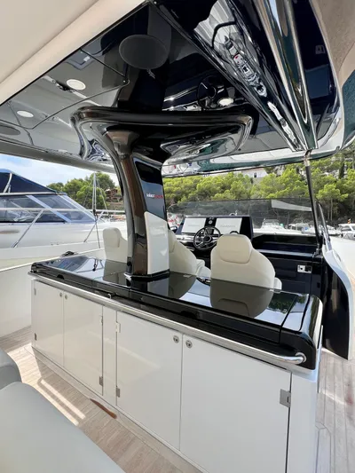  Yacht Photos Pics 2024 Solaris Power 44 Open yacht interior with sleek design and modern amenities.