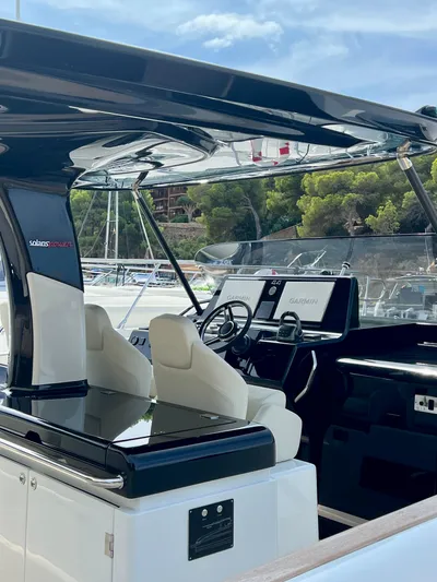  Yacht Photos Pics 2024 Solaris Power 44 Open yacht interior with sleek design and modern navigation equipment.