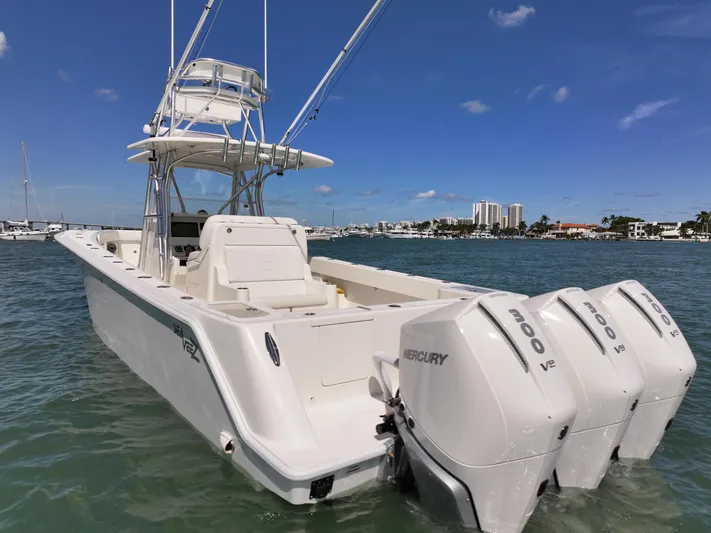  Yacht Photos Pics 2020 SeaVee 370z boat with triple Mercury engines on the water.