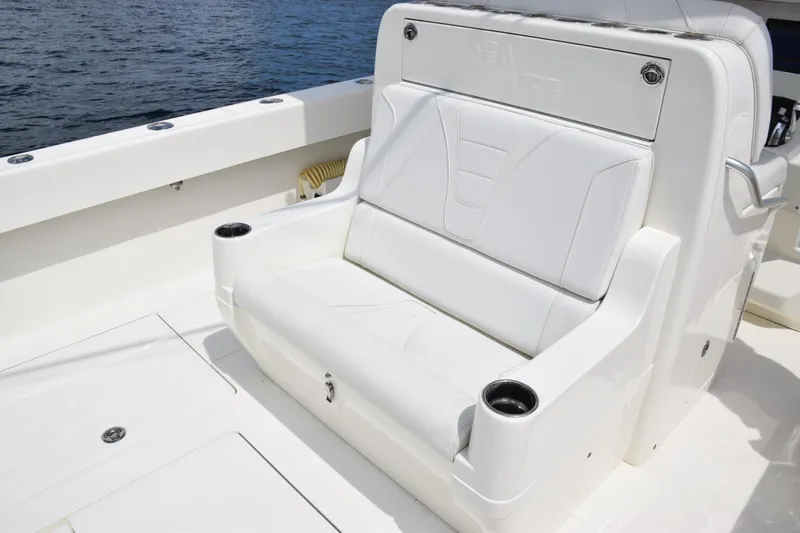 Yacht Photos Pics 2020 SeaVee 370z boat with white seating and cup holders on deck.