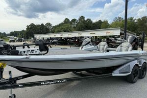 2026 Ranger Z521 boat on trailer, parked outdoors with dealership in background.