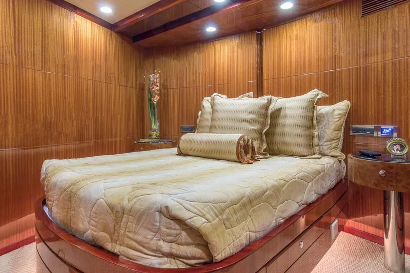 Robin's Nest Yacht Photos Pics Luxurious bedroom in 2008 Ocean Alexander 100 Skylounge Megayacht with elegant wood paneling.