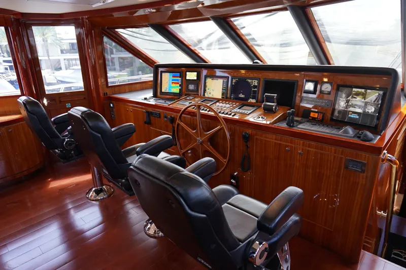 Robin's Nest Yacht Photos Pics Pilothouse of 2008 Ocean Alexander 100 Skylounge Megayacht with luxurious wood finish.