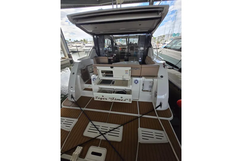 Tiger "times" 2 Yacht Photos Pics 2017 Sea Ray Sundancer 400 yacht docked, featuring spacious deck and seating area.