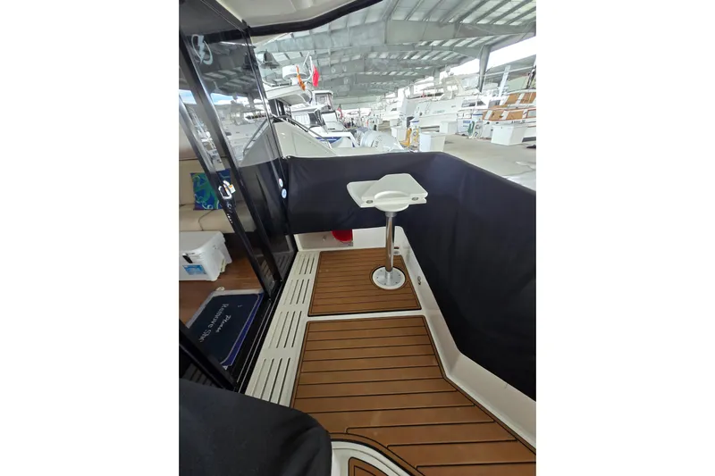 Tiger "times" 2 Yacht Photos Pics 2017 Sea Ray Sundancer 400 yacht interior with teak flooring and seating area.