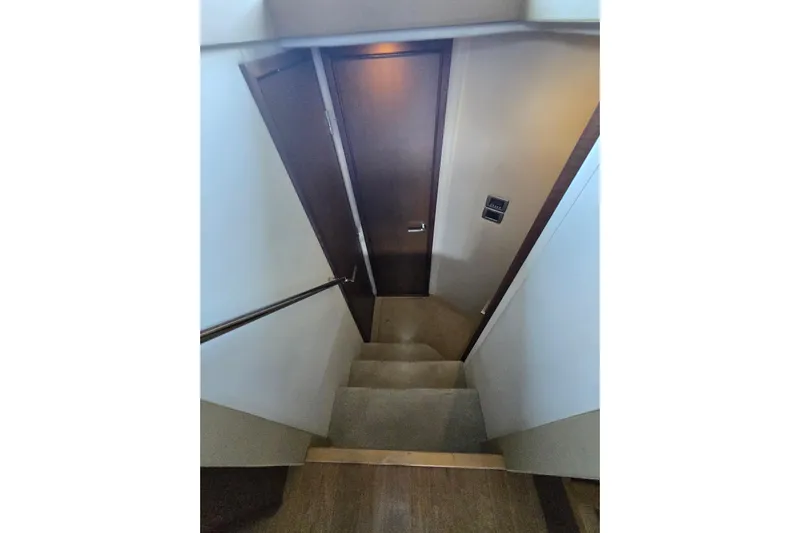 Tiger "times" 2 Yacht Photos Pics Staircase leading to cabin door inside 2017 Sea Ray Sundancer 400 yacht.