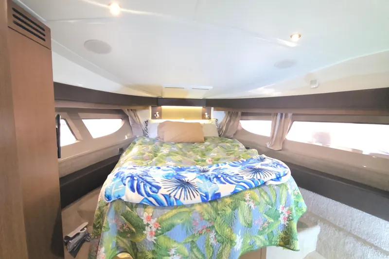 Tiger "times" 2 Yacht Photos Pics Luxurious 2017 Sea Ray Sundancer 400 cabin interior with cozy bed and elegant decor.