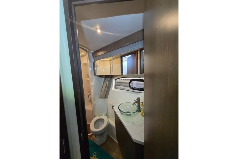 Tiger "times" 2 Yacht Photos Pics Bathroom interior of 2017 Sea Ray Sundancer 400 yacht with modern fixtures.
