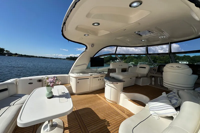 Apres Sea Yacht Photos Pics Luxurious 2006 Sea Ray 52 Sundancer yacht interior with elegant seating and scenic water view.