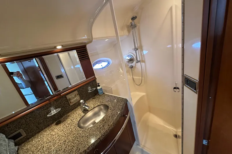 Apres Sea Yacht Photos Pics Luxurious bathroom in 2006 Sea Ray 52 Sundancer yacht with granite countertop and shower.