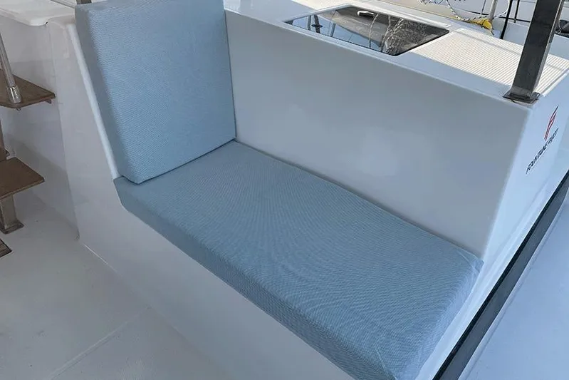  Yacht Photos Pics 2018 Fountaine Pajot Lucia 40 yacht seating area with blue cushion.