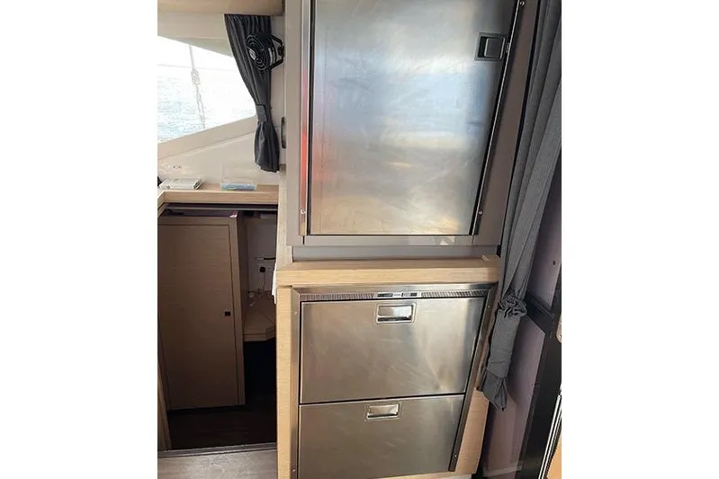  Yacht Photos Pics Interior of 2018 Fountaine Pajot Lucia 40 catamaran with stainless steel cabinets.