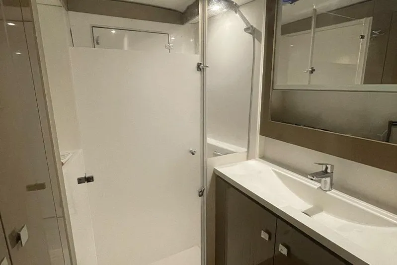  Yacht Photos Pics Modern bathroom interior of 2018 Fountaine Pajot Lucia 40 catamaran.