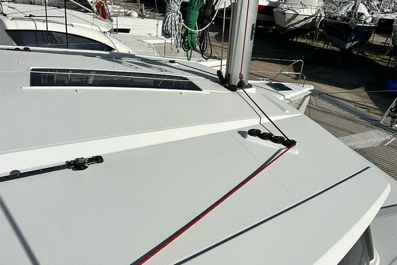  Yacht Photos Pics Deck view of 2018 Fountaine Pajot Lucia 40 catamaran, showcasing sleek design and rigging.