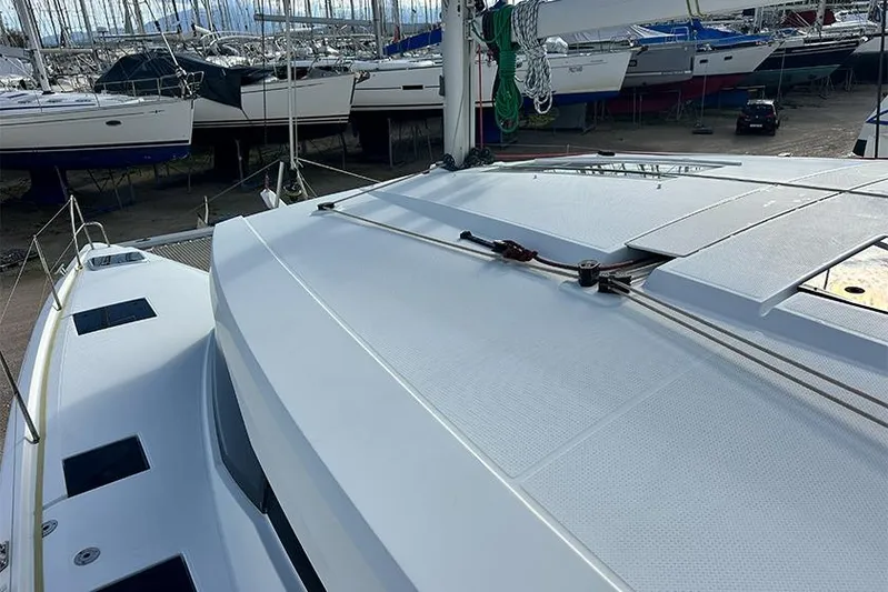  Yacht Photos Pics 2018 Fountaine Pajot Lucia 40 catamaran on deck, surrounded by other boats.