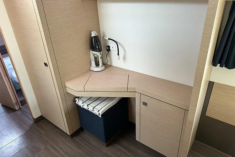  Yacht Photos Pics Interior of 2018 Fountaine Pajot Lucia 40 catamaran with modern wooden cabinetry.