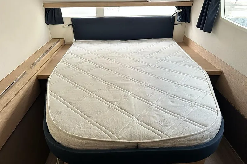  Yacht Photos Pics Cabin interior of 2018 Fountaine Pajot Lucia 40 with a comfortable bed.